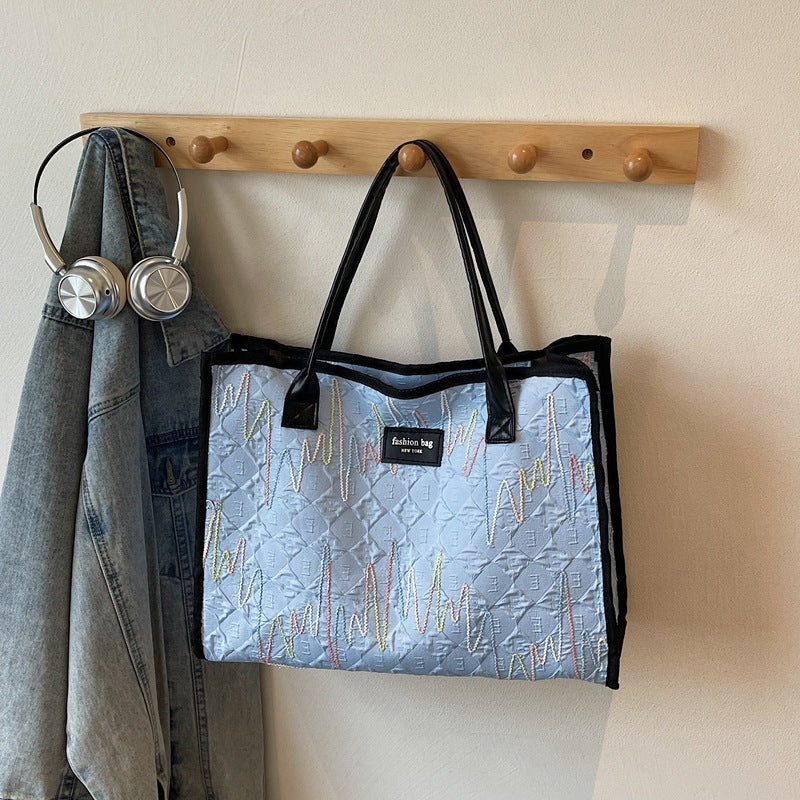Damen modebewusste Tragetasche mit stilvollem Wellenmuster Nord Taschen