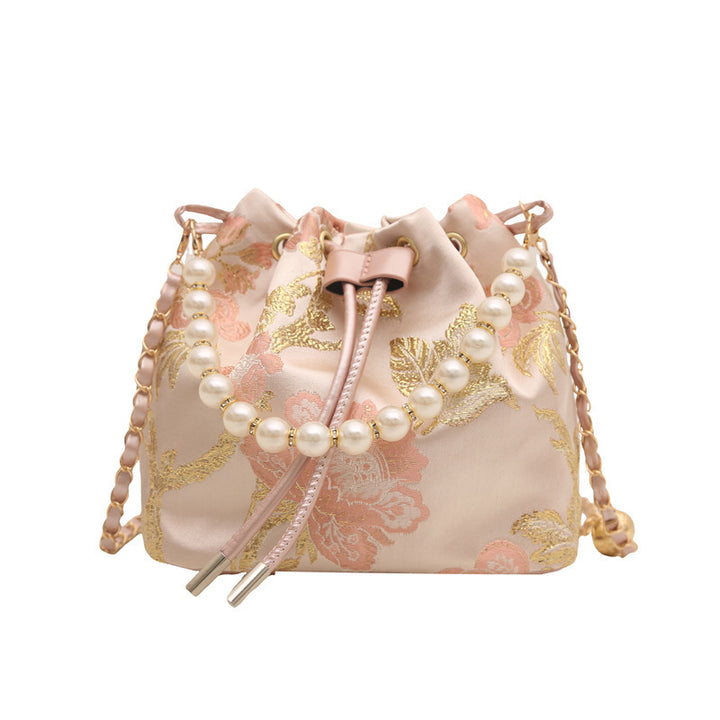 Damen modische Beuteltasche mit floralem Design und Perlenakzenten Nord Taschen