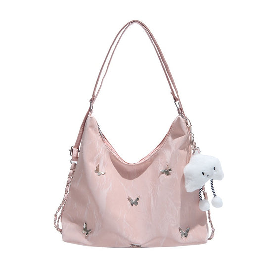 Damen modische Hobo-Tasche mit verspieltem Anhänger und detailreicher Verzierung Nord Taschen