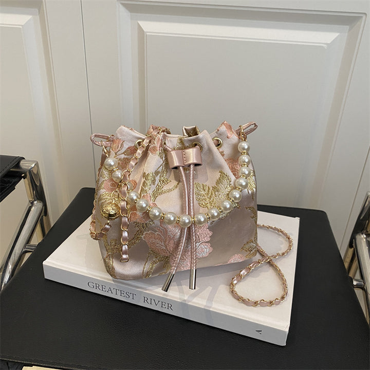 Damen modische Beuteltasche mit floralem Design und Perlenakzenten Nord Taschen