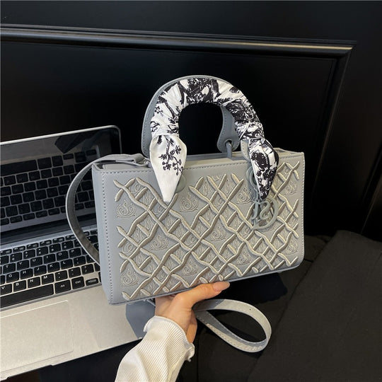 Damen elegante Handtasche mit strukturiertem Design und modischem Halsschal Nord Taschen