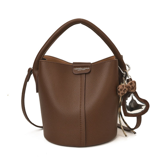 Damen Bucket-Handtasche mit minimalistischem Design und abnehmbarem Anhänger Nord Taschen
