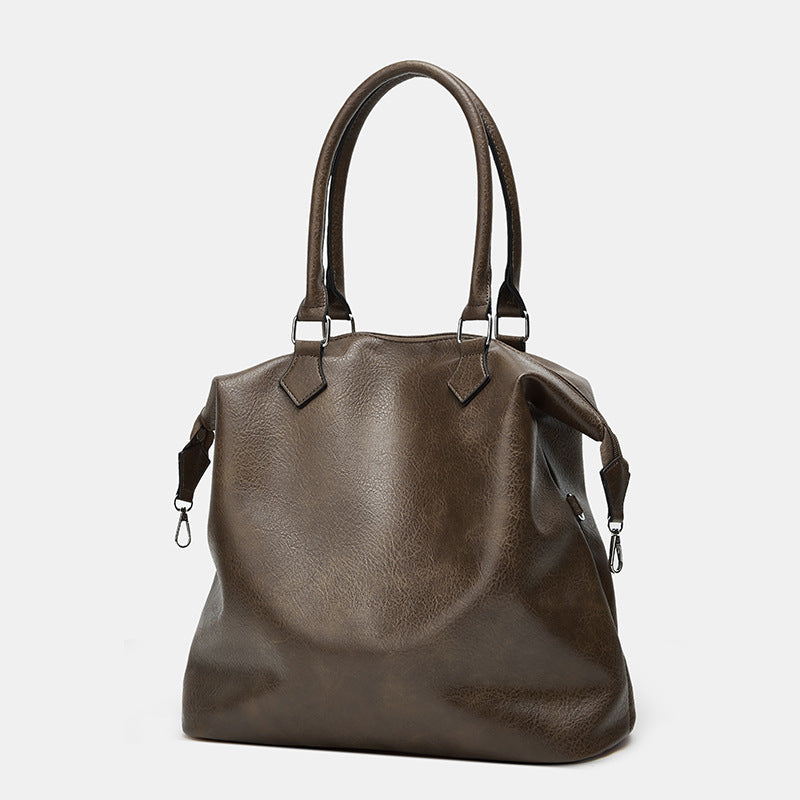 Damen Handtasche mit verstellbarem Schulterriemen und eleganter Lederstruktur Nord Taschen