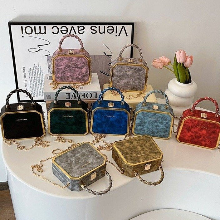 Damen elegante Handtasche im geometrischen Design mit goldenen Akzenten Nord Taschen