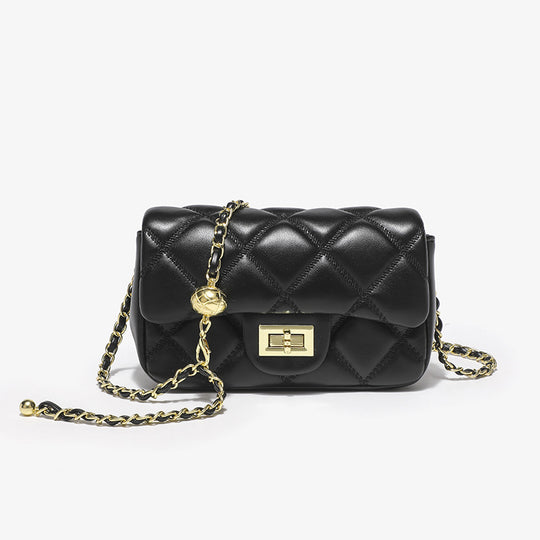Damen elegante Schultertasche mit stilvoller Steppung und markanten Metallakzenten Nord Taschen