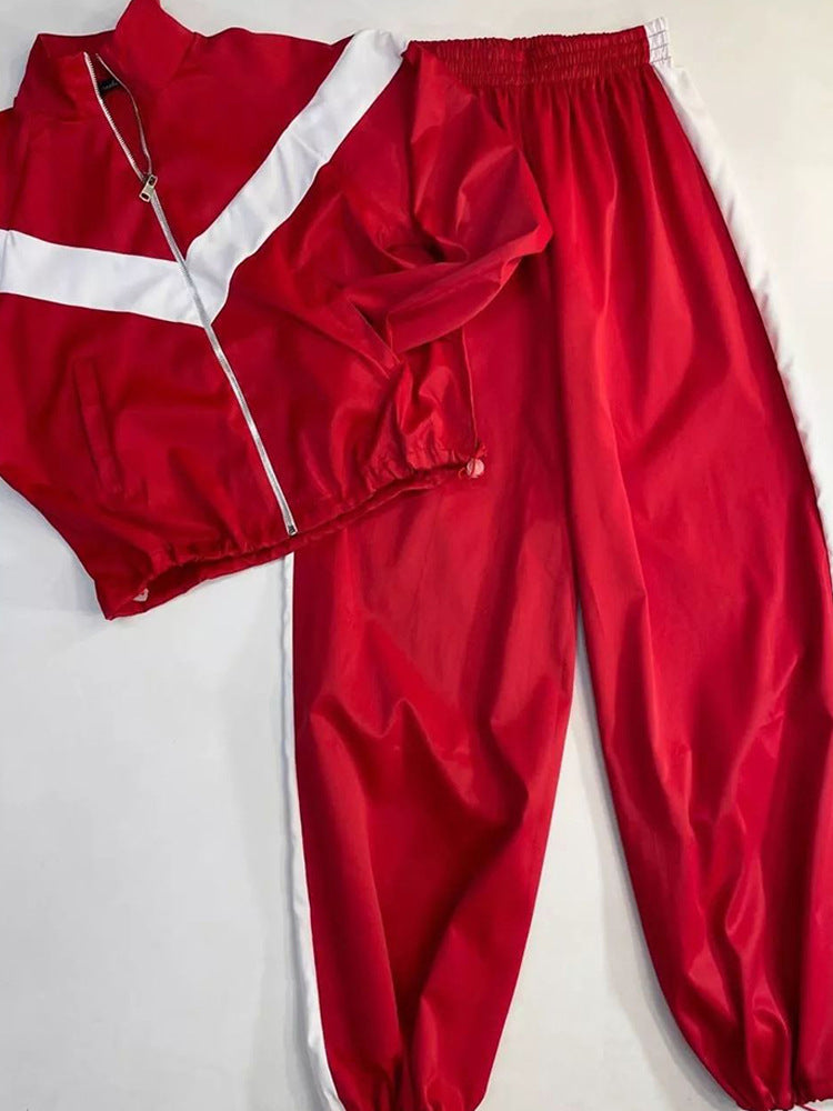 Damen eleganter sportlicher Zweiteiler Trainingsanzug mit Reißverschluss und kontrastierender V-Passe Nord Taschen