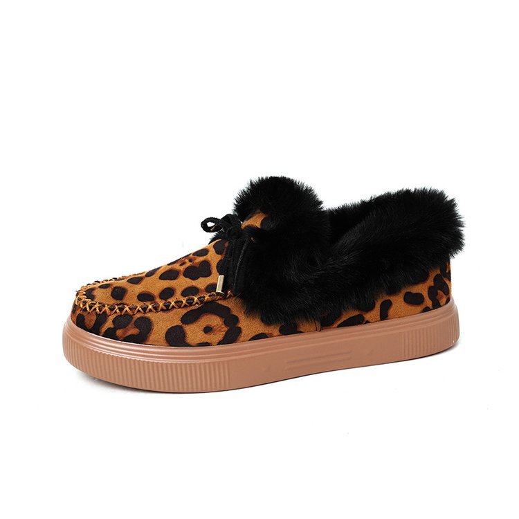 Damen Kuschel‑Mokassin‑Slipper mit hochfloriger Fellmanschette, dekorativer Steppnaht und leichtem Plateau‑Sohlenprofil Nord Taschen