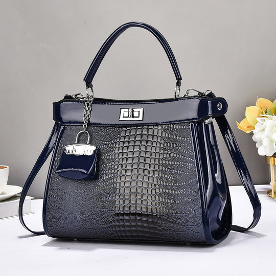 Damen Handtasche mit glänzender Krokodil-Prägung und abnehmbarer Mini-Clutch Nord Taschen