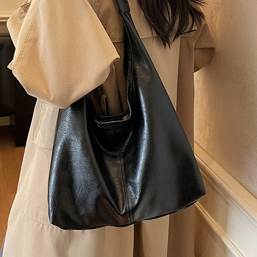 Damen Hobo-Tasche aus weichem Kunstleder mit praktischem Innenteil Nord Taschen