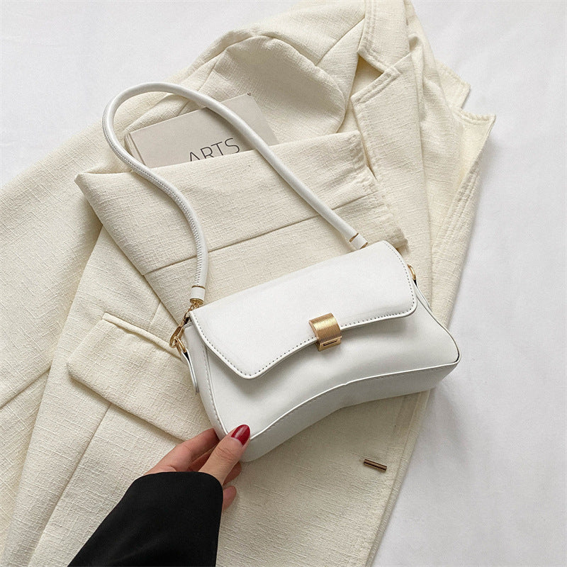 Damen elegante Umhängetasche mit goldener Verschlussmechanik Nord Taschen