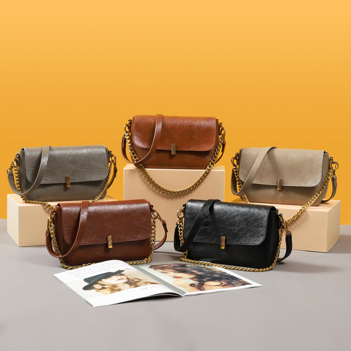 Damen Umhängetasche aus hochwertigem Kunstleder mit elegantem Klappenverschluss Nord Taschen