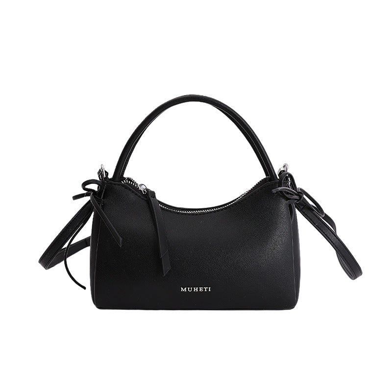 Damenhandtasche im charmanten Retro-Stil mit verspieltem Anhänger Nord Taschen