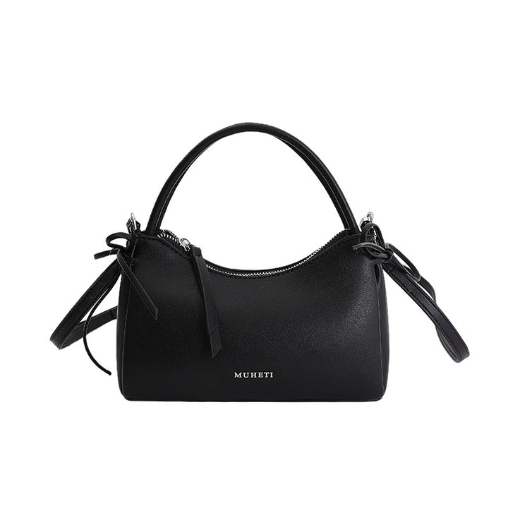 Damenhandtasche im charmanten Retro-Stil mit verspieltem Anhänger Nord Taschen
