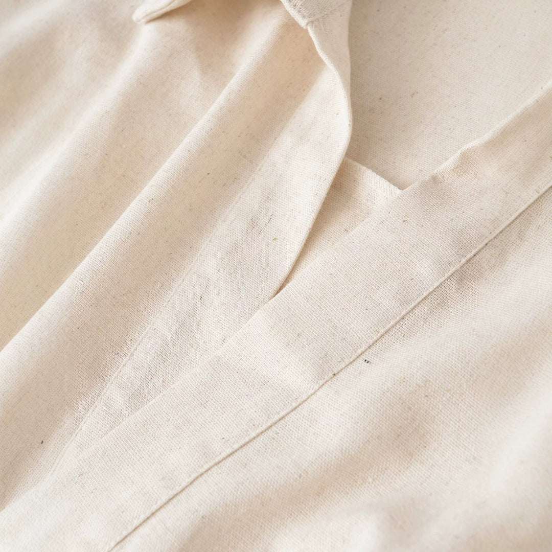 Damen Oversize-Leinenbluse mit offenem V‑Ausschnitt und gerafftem Saum Nord Taschen
