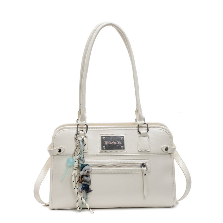 Damen Handtasche mit dekorativem Anhänger | Nord Taschen