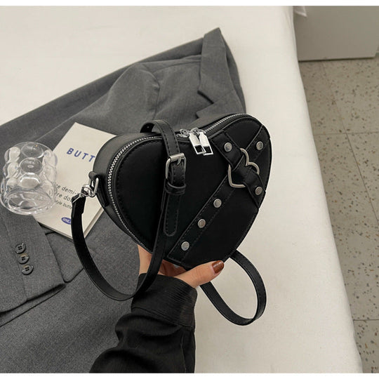 Nord Taschen | Umhängetasche für Damen - Herzförmige Crossbody-Tasche im auffälligen Design mit Riemenverschluss