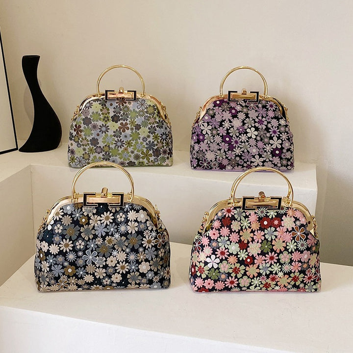 Damen elegante Umhängetasche mit floralen Akzenten und goldenen Verzierungen Nord Taschen