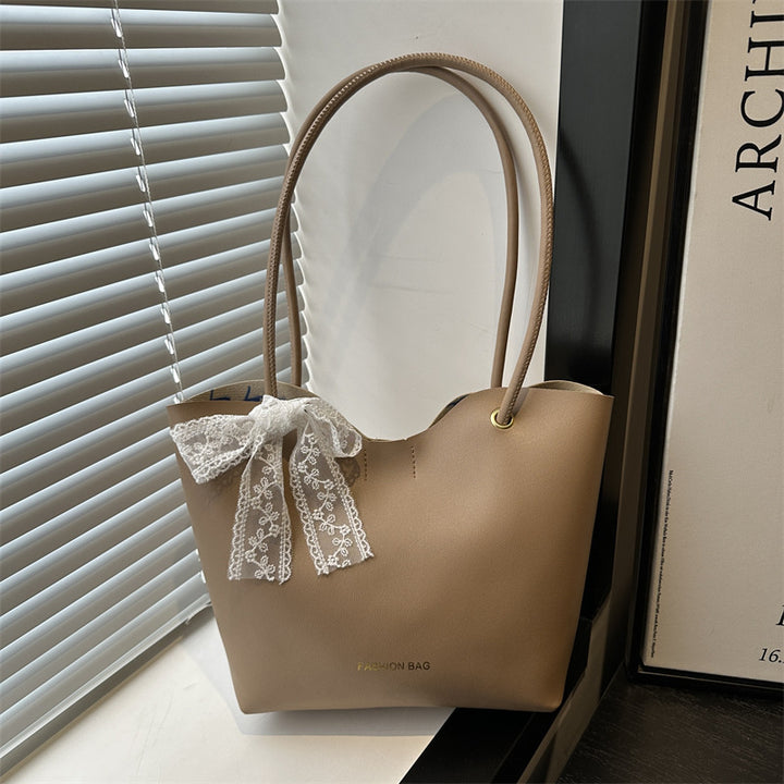 Damen Tote-Tasche aus hochwertigem Kunstleder mit verspieltem Schleifendetail Nord Taschen