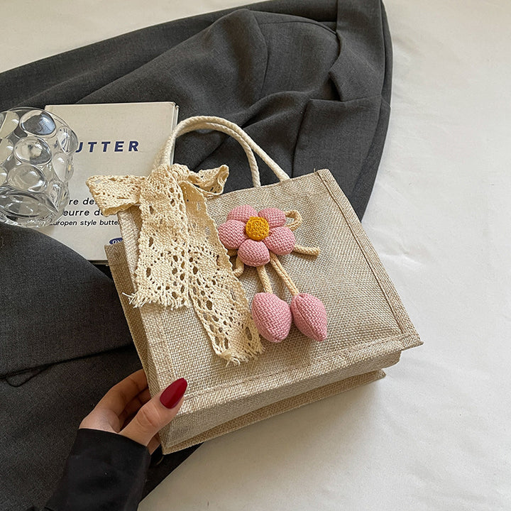Damen Tragetasche mit floralem Häkelmuster und verspieltem Dekoband Nord Taschen
