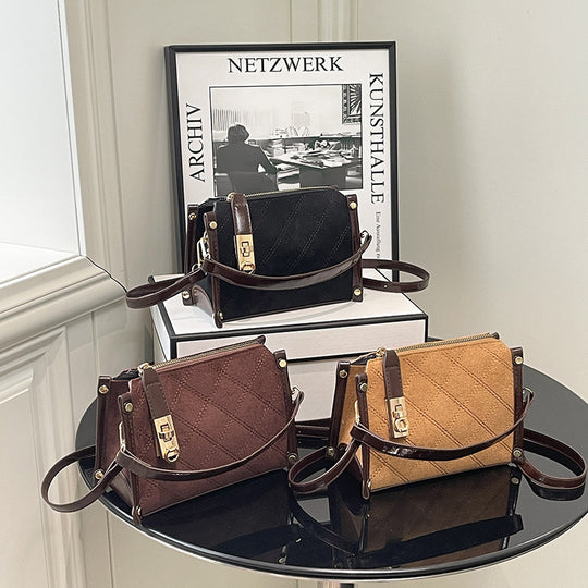 Damen elegante Handtasche mit glänzenden Akzenten und praktischem Reißverschluss Nord Taschen