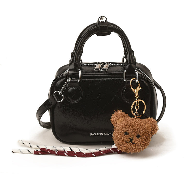 Damen Mini-Handtasche mit niedlichem Anhänger Nord Taschen