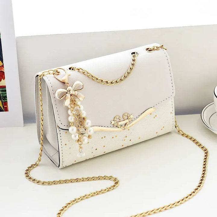 Damen elegante Umhängetasche mit glänzenden Akzenten Nord Taschen