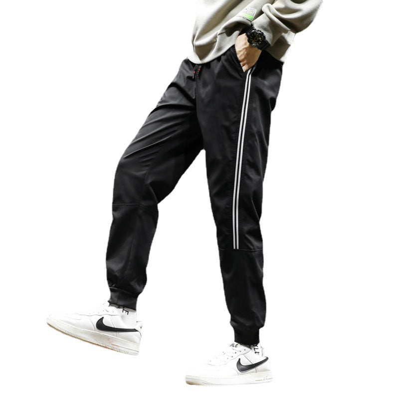 Herren Sportive Jogginghose im Trackstyle mit seitlichen Kontraststreifen, Tunnelzug und elastischen Bündchen Nord Taschen