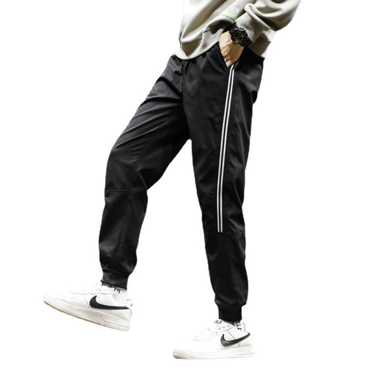 Herren Sportive Jogginghose im Trackstyle mit seitlichen Kontraststreifen, Tunnelzug und elastischen Bündchen Nord Taschen