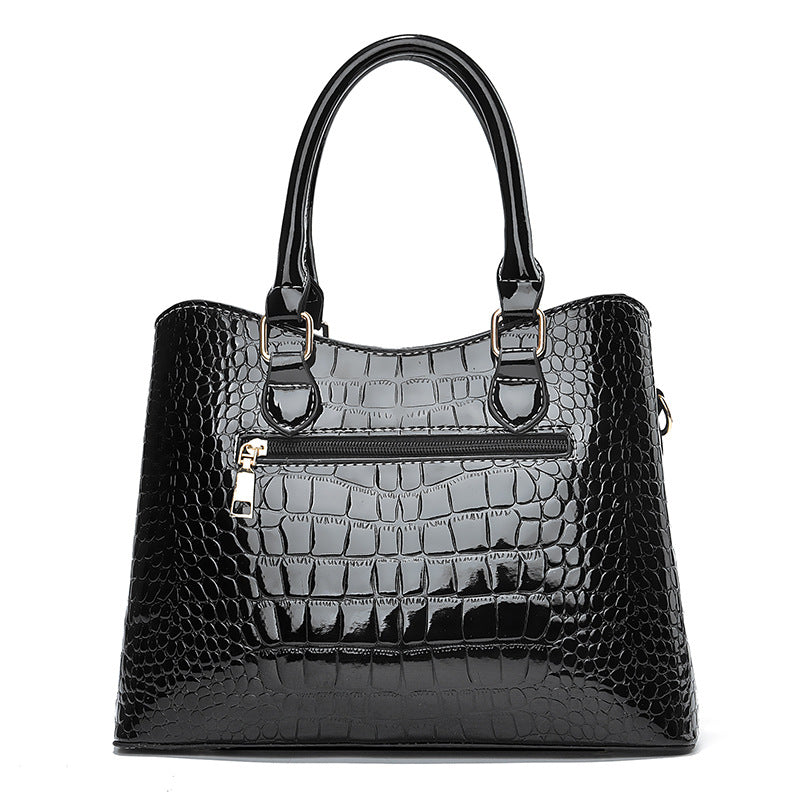 Damen elegante Handtasche mit schimmernder Krokodilprägung und vielseitigem Tragesystem Nord Taschen