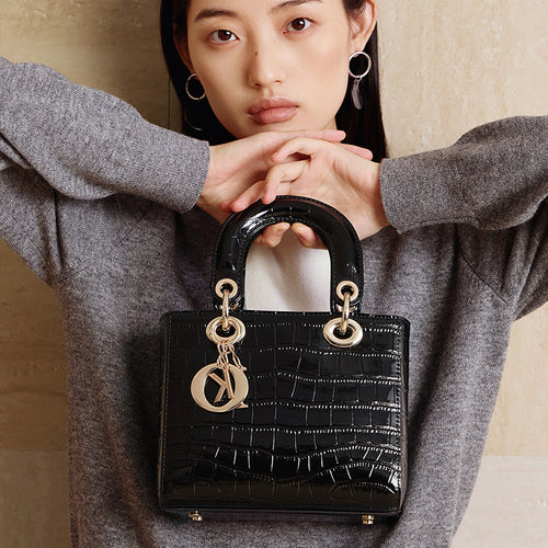 Damen Handtasche im eleganten Krokodil-Look mit goldenen Akzenten Nord Taschen