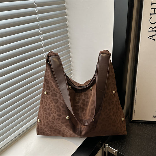Damen Hobo-Tasche mit elegantem Leopardenmuster und goldenen Akzenten Nord Taschen