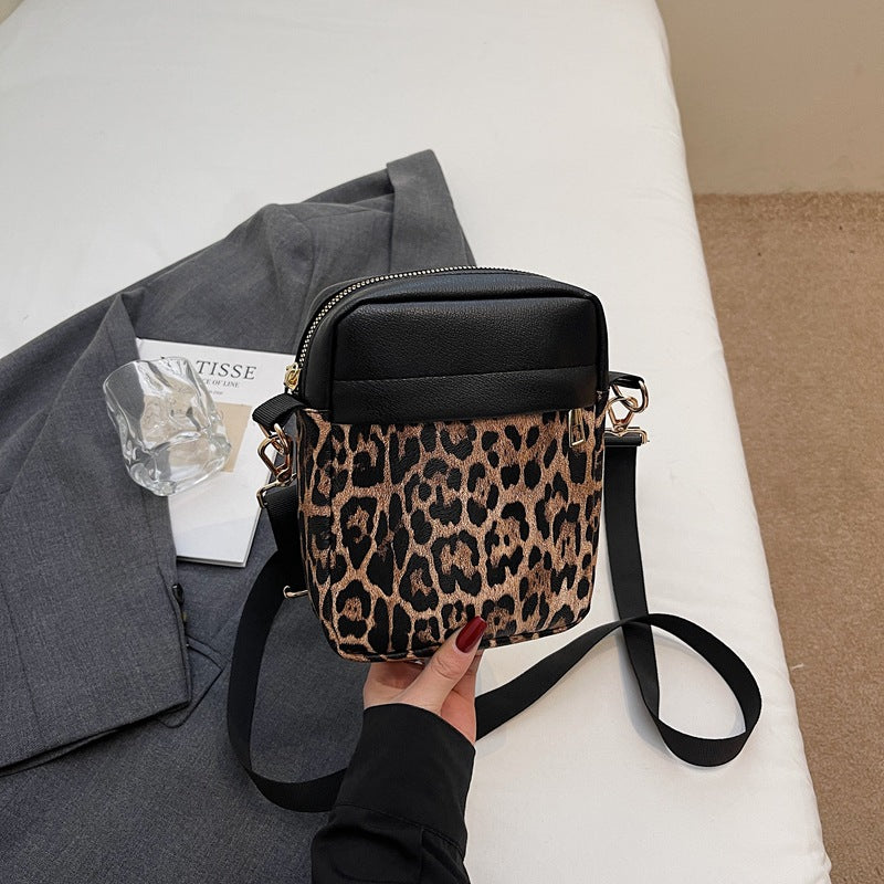 Damen Umhängetasche mit elegantem Leopardenmuster und praktischem Innenraum Nord Taschen