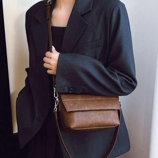 Damen elegante Umhängetasche aus hochwertigem Kunstleder mit praktischem Reißverschluss Nord Taschen