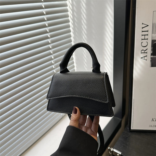 Damen Mini-Handtasche mit verstellbarem Riemen und elegantem Design Nord Taschen