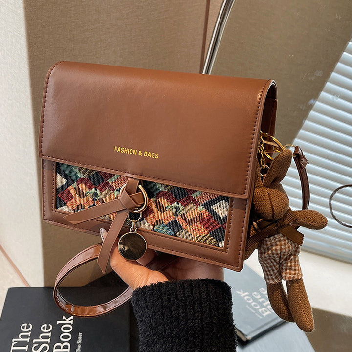Damen Umhängetasche mit elegantem Knotenverschluss und floralem Muster Nord Taschen