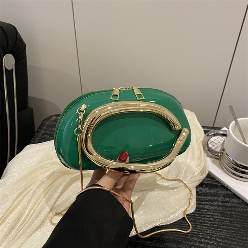 Damen Handtasche mit innovativem Kettenverschluss und funkelndem Design Nord Taschen