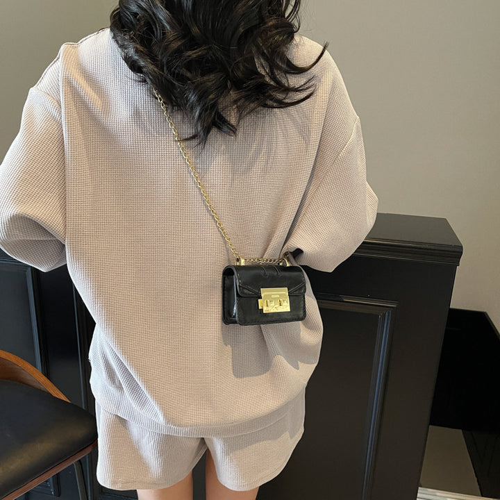 Damen Mini-Handtasche mit eleganten Metallakzenten Nord Taschen