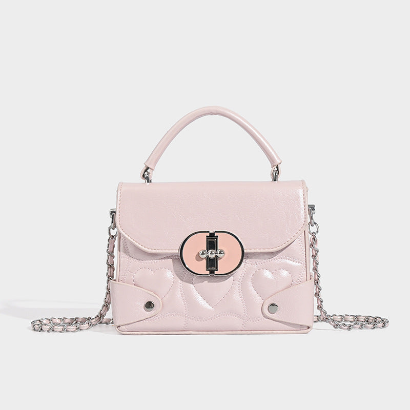 Damen Handtasche mit herzförmigem Design und schickem Kettenriemen Nord Taschen