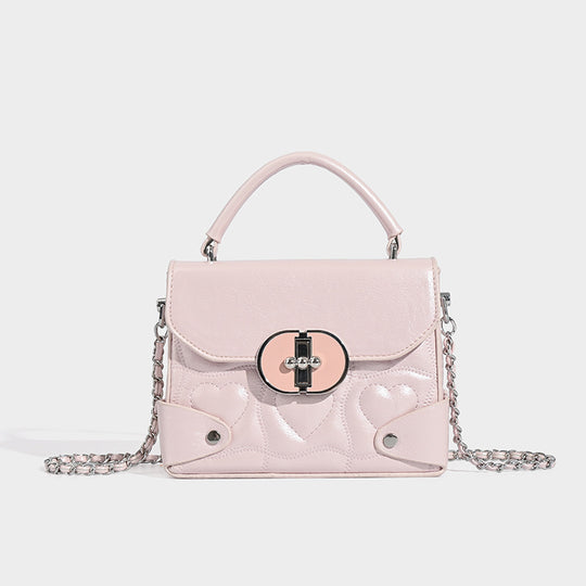 Damen Handtasche mit herzförmigem Design und schickem Kettenriemen Nord Taschen