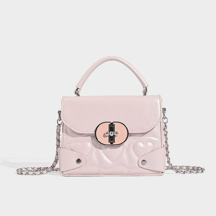 Damen Handtasche mit herzförmigem Design und schickem Kettenriemen Nord Taschen