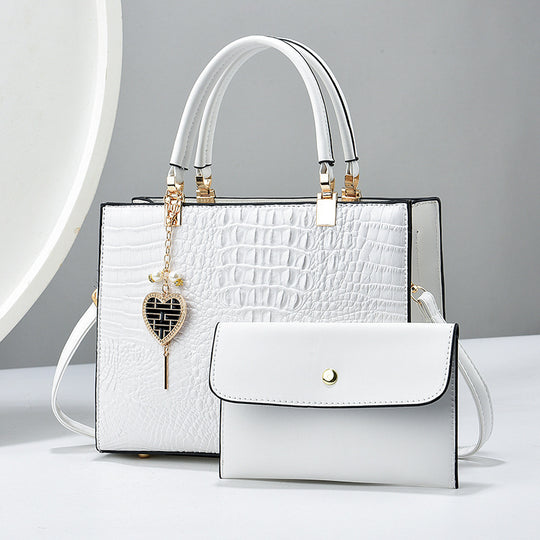 Damen Handtasche mit edler Krokodilprägung und abnehmbarer Clutch Nord Taschen