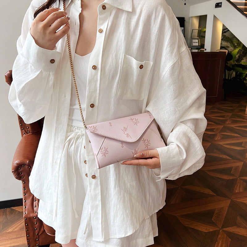 Damen elegante Clutch-Tasche mit floralem Design Nord Taschen