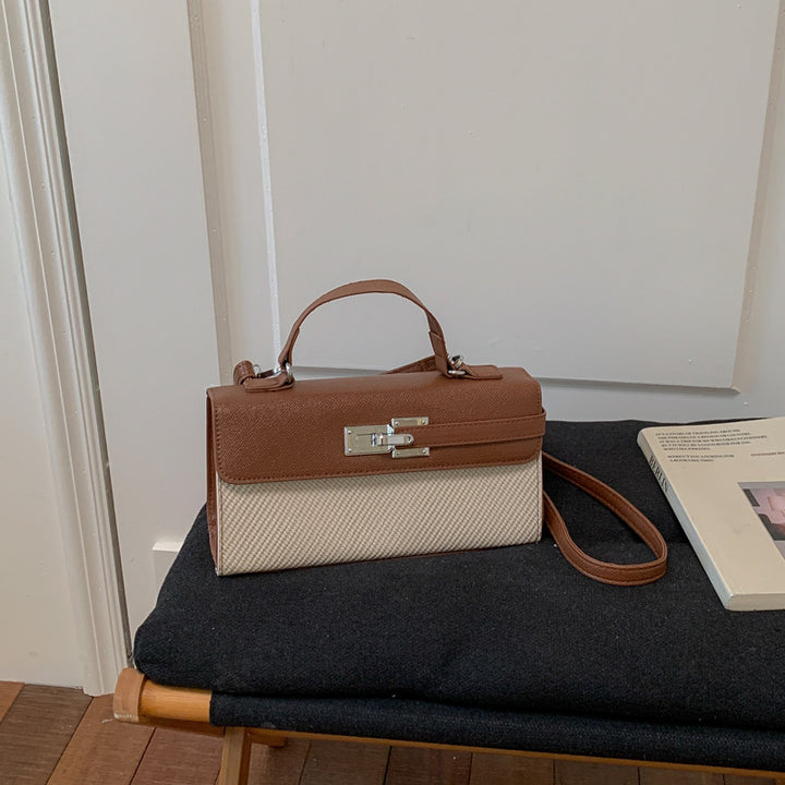 Damen Umhängetasche mit strukturiertem Obermaterial und elegantem Verschluss Nord Taschen
