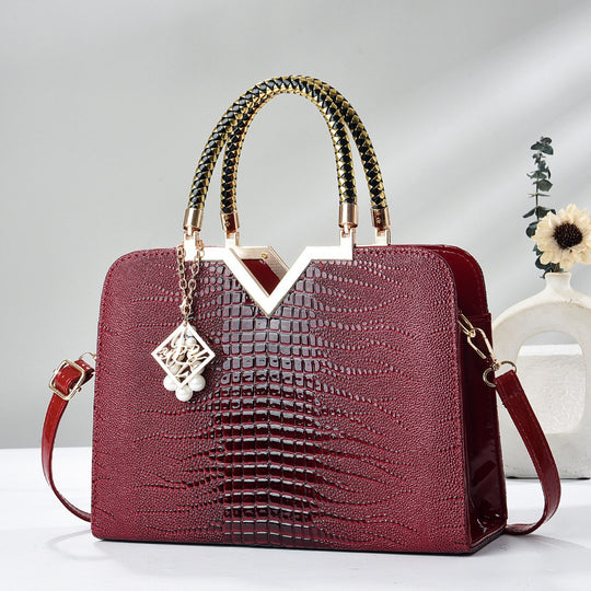 Damen elegante Handtasche mit luxuriöser Croco-Prägung und goldenen Akzenten Nord Taschen