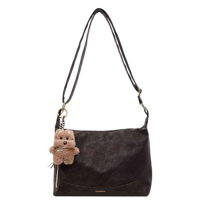Damen Schultertasche mit abnehmbarem Plüschanhänger Nord Taschen