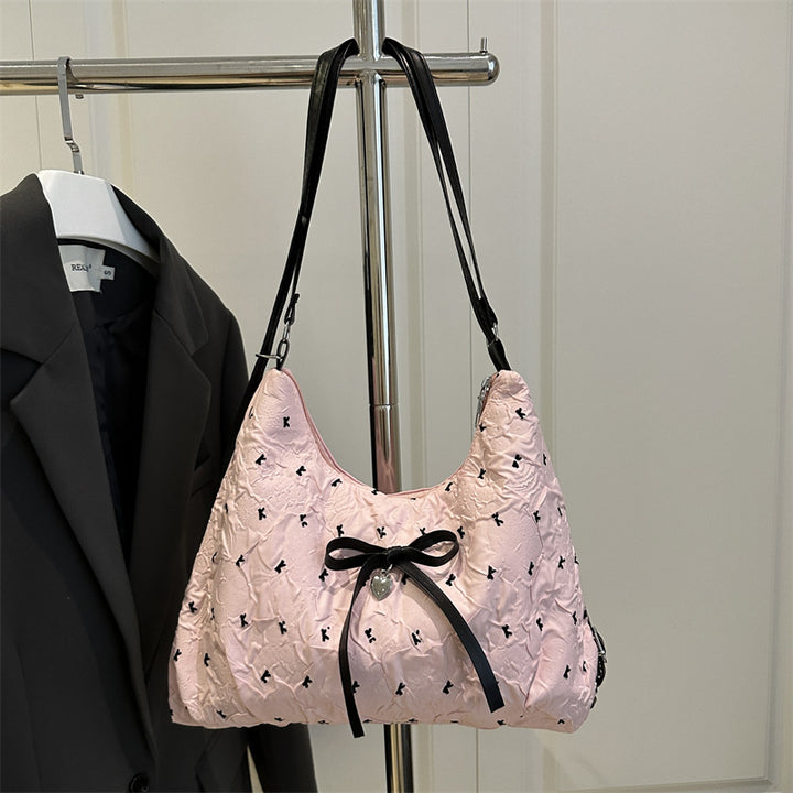 Damen modische Schultertasche mit schimmernder Oberfläche und dekorativen Details Nord Taschen