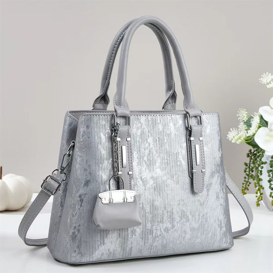 Damen elegante Handtasche mit dekorativem Schlüsselanhänger Nord Taschen