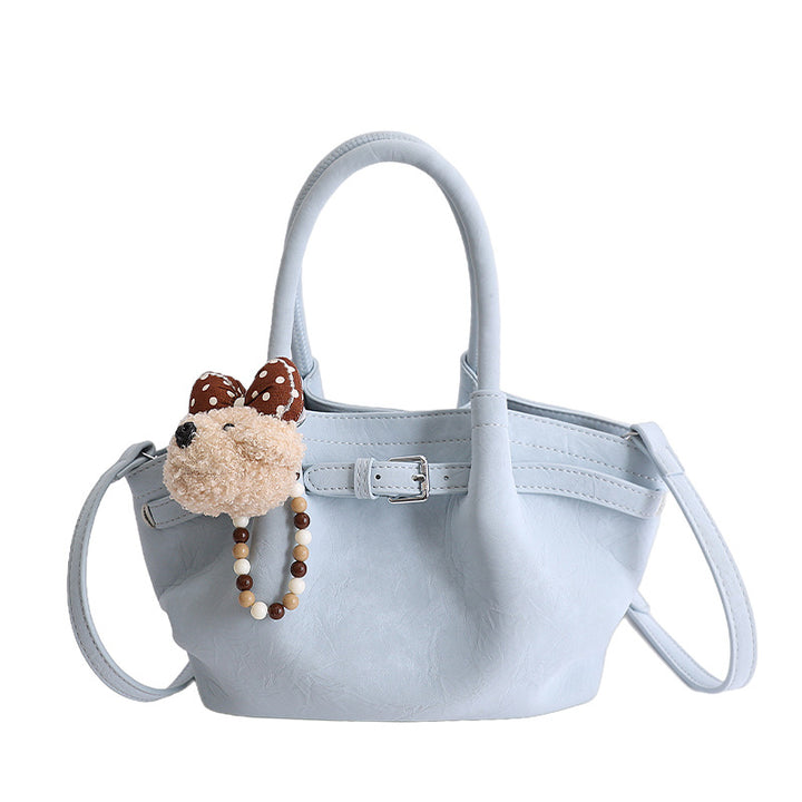 Damen elegante Handtasche mit verspieltem Tieranhänger Nord Taschen