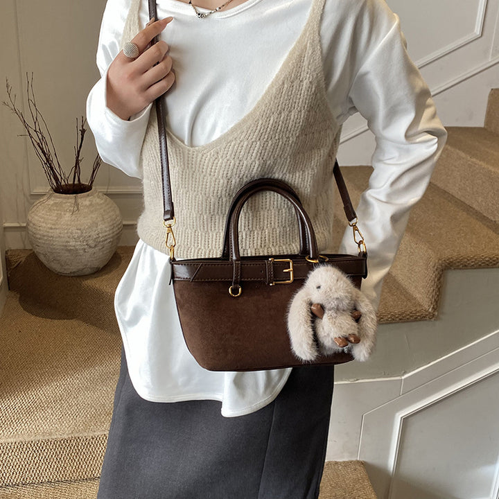 Damen elegante Handtasche mit flauschigem Anhänger Nord Taschen