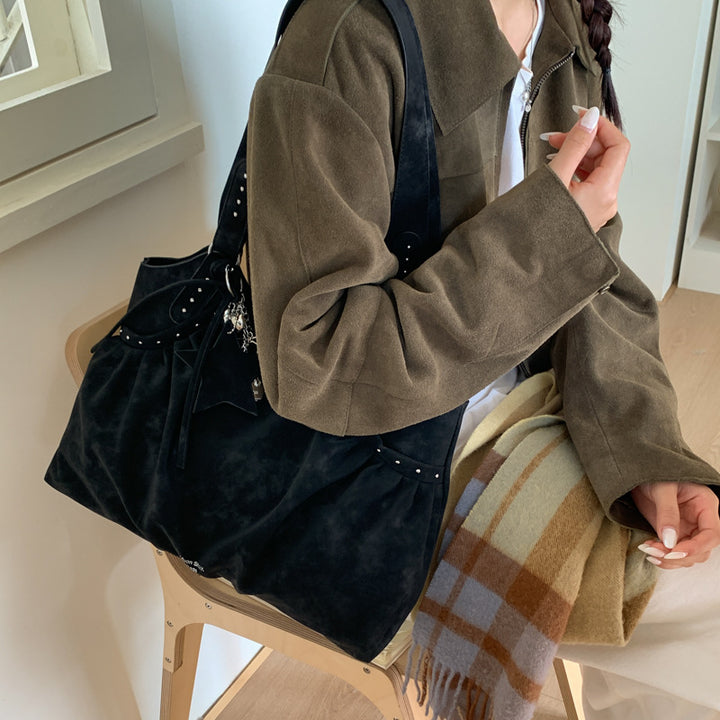 Damen Tasche mit raffiniertem Rüschendesign und Akzenten aus Metall von Nord Taschen